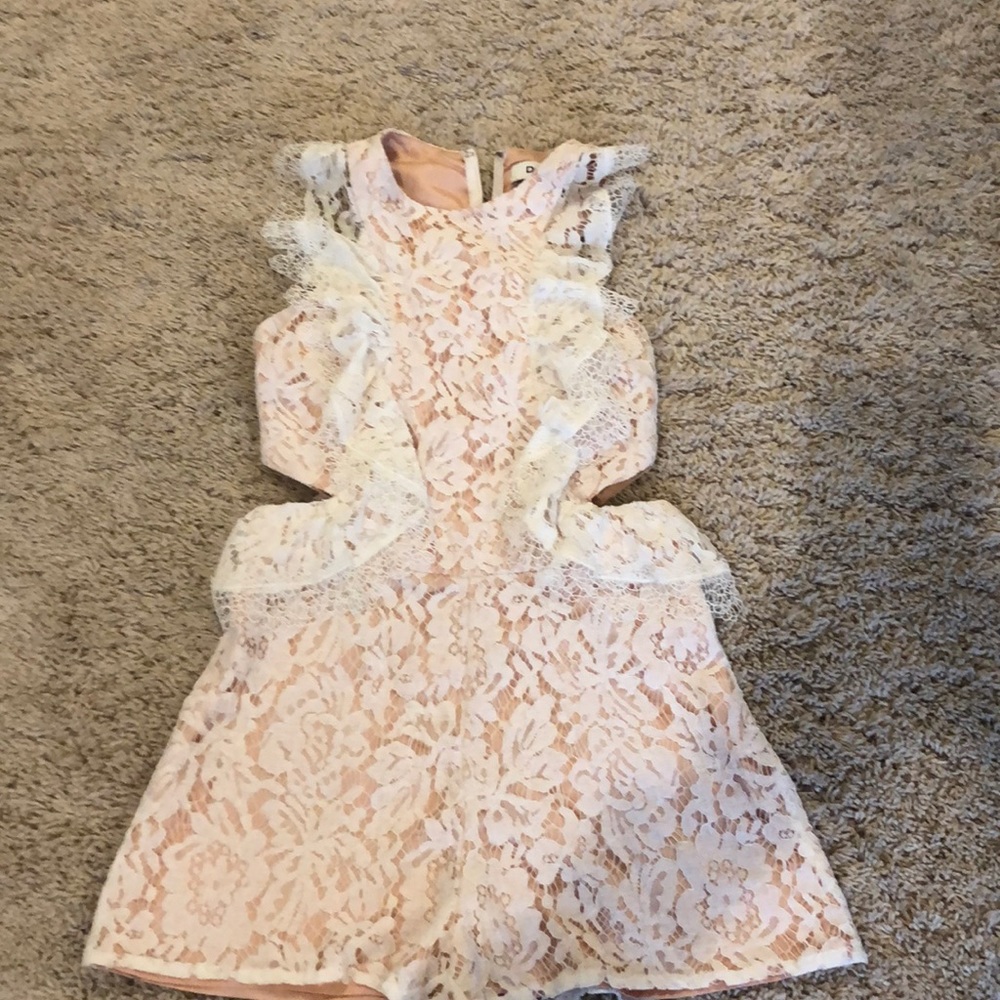 White lace romper with peach/pink underlay